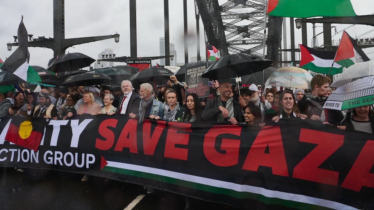 People marching on the bridge.