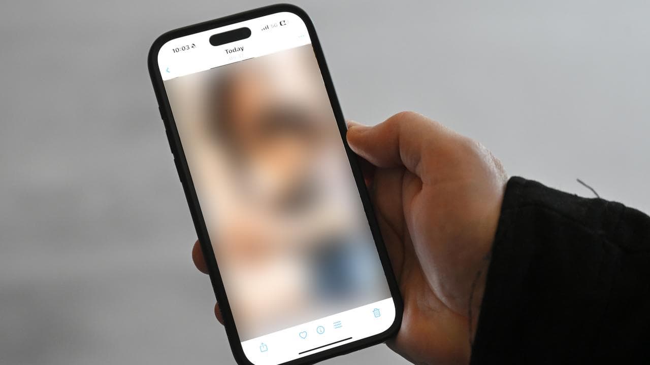 A blurred out AI child sexual exploitation image