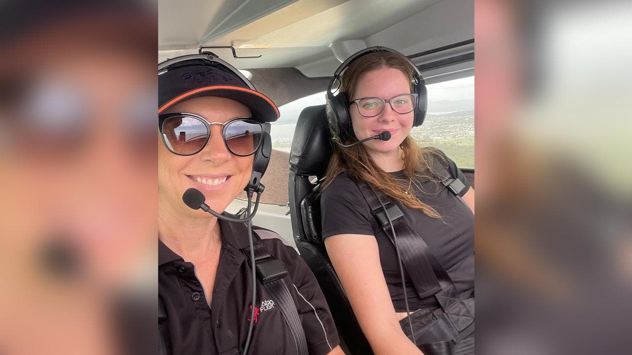 Pilot and trainee in a plane