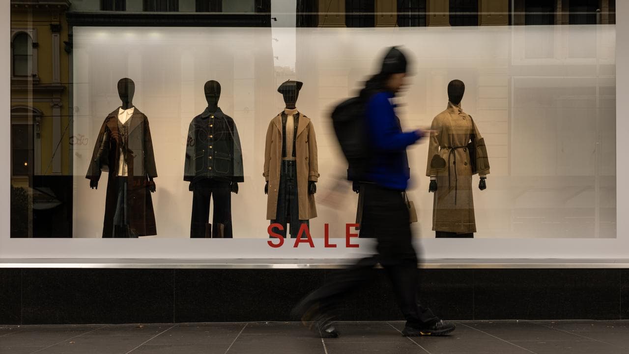 People walk along Bourke Street Mall in Melbourne