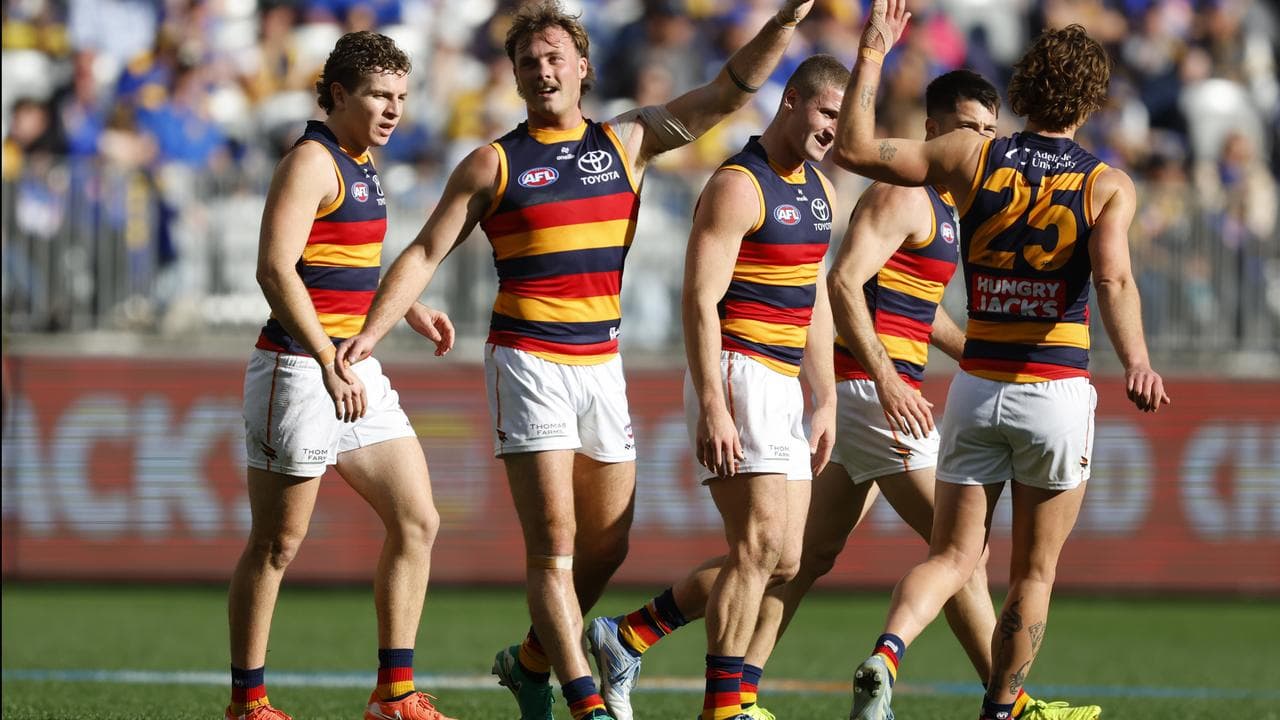 Adelaide players celebrate.