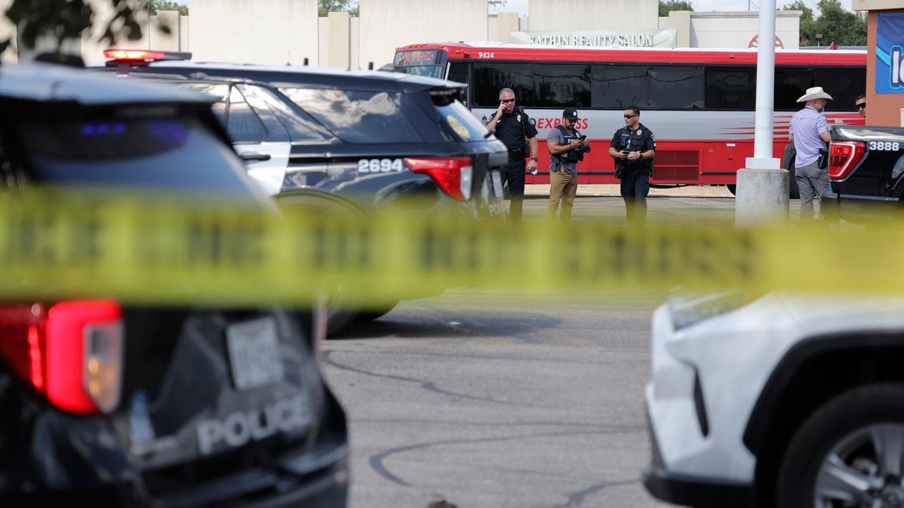 Police monitor the scene after a fatal shooting in Austin