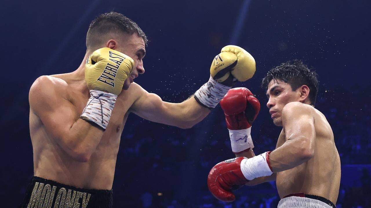 Andrew Moloney (left) of Australia and Pedro Guevara of Mexico