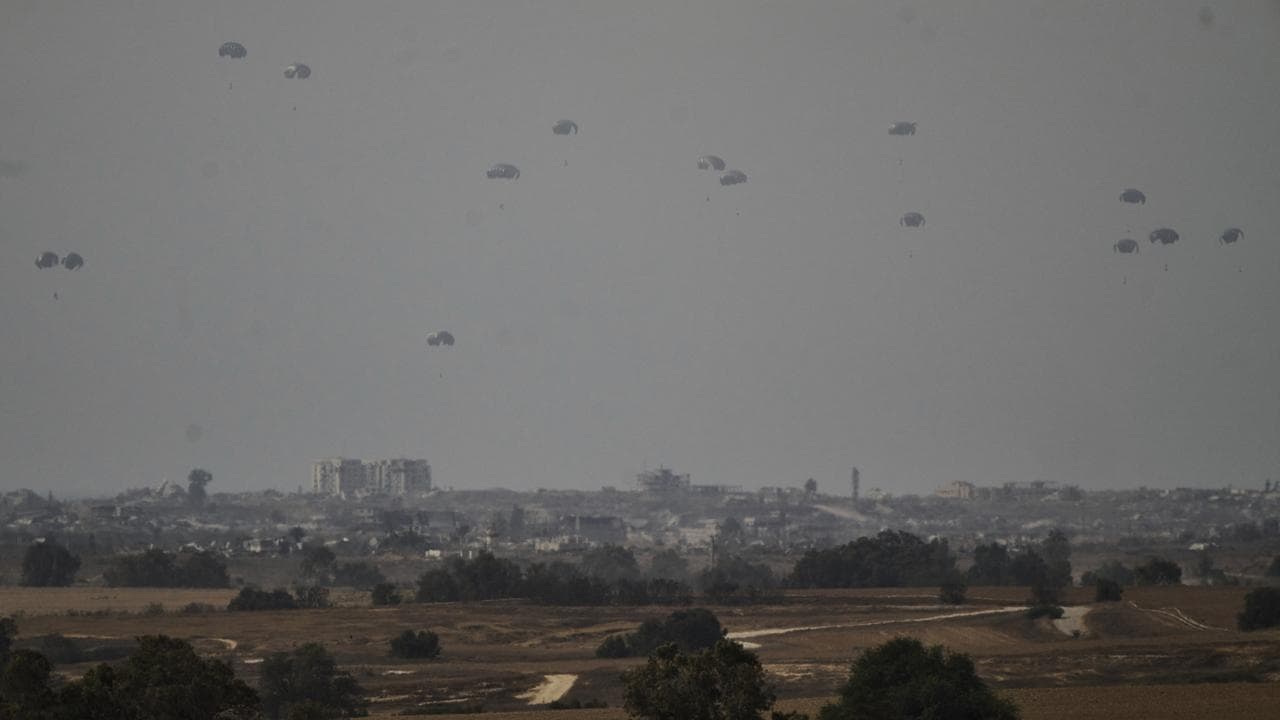 Parachutes drop supplies into the Gaza Strip