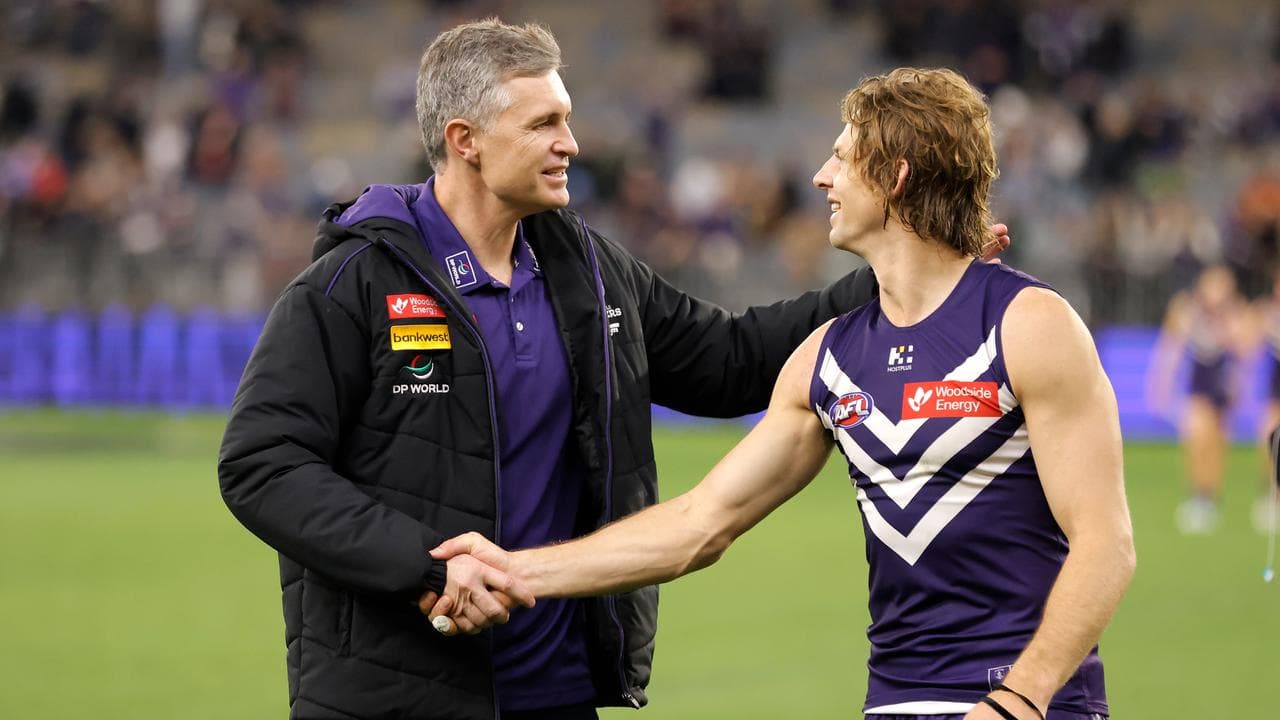 Coach Justin Longmuir and the retiring Nat Fyfe