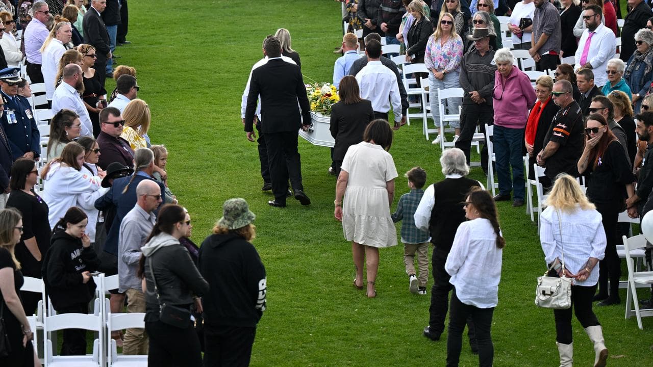 Family and supporters at Molly Ticehurst's funeral (file)