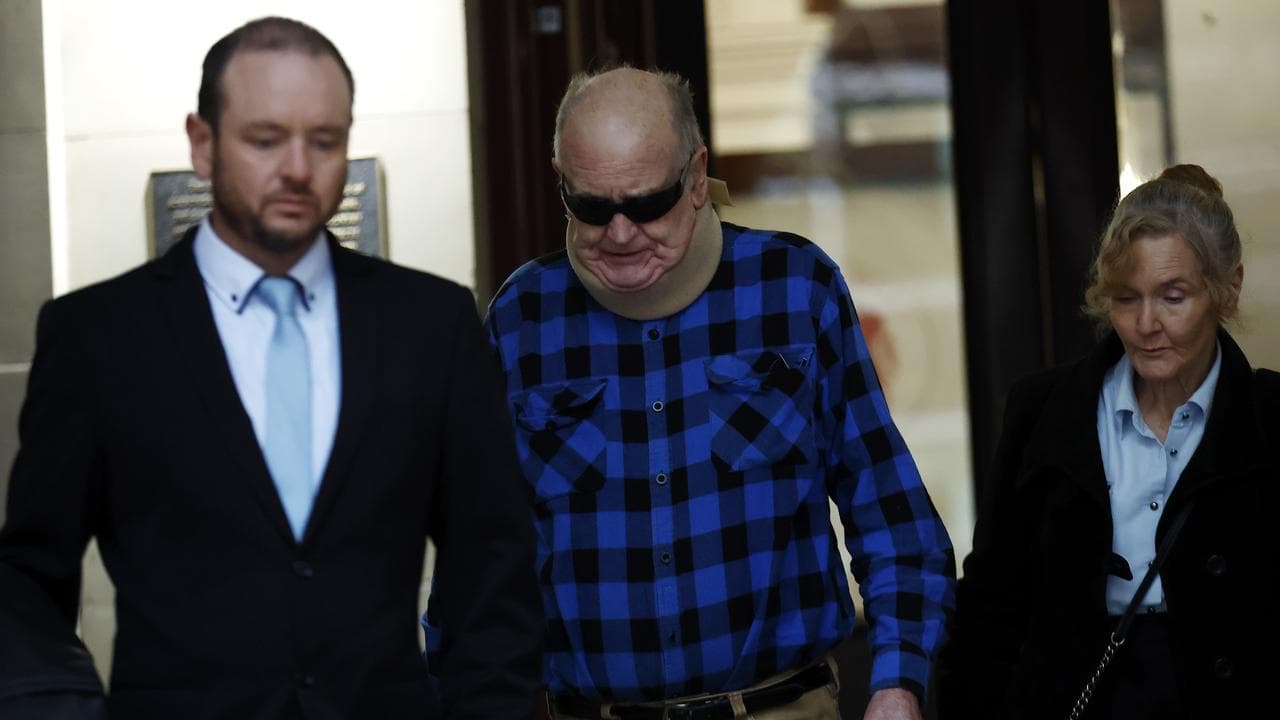 Steven Johnson (centre) leaves the Supreme Court of Victoria