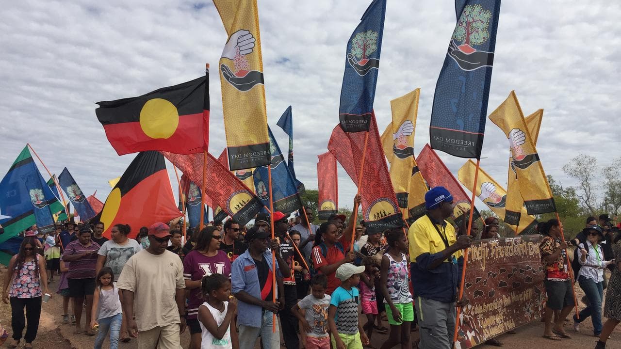 Marchers celebrate the walk-off