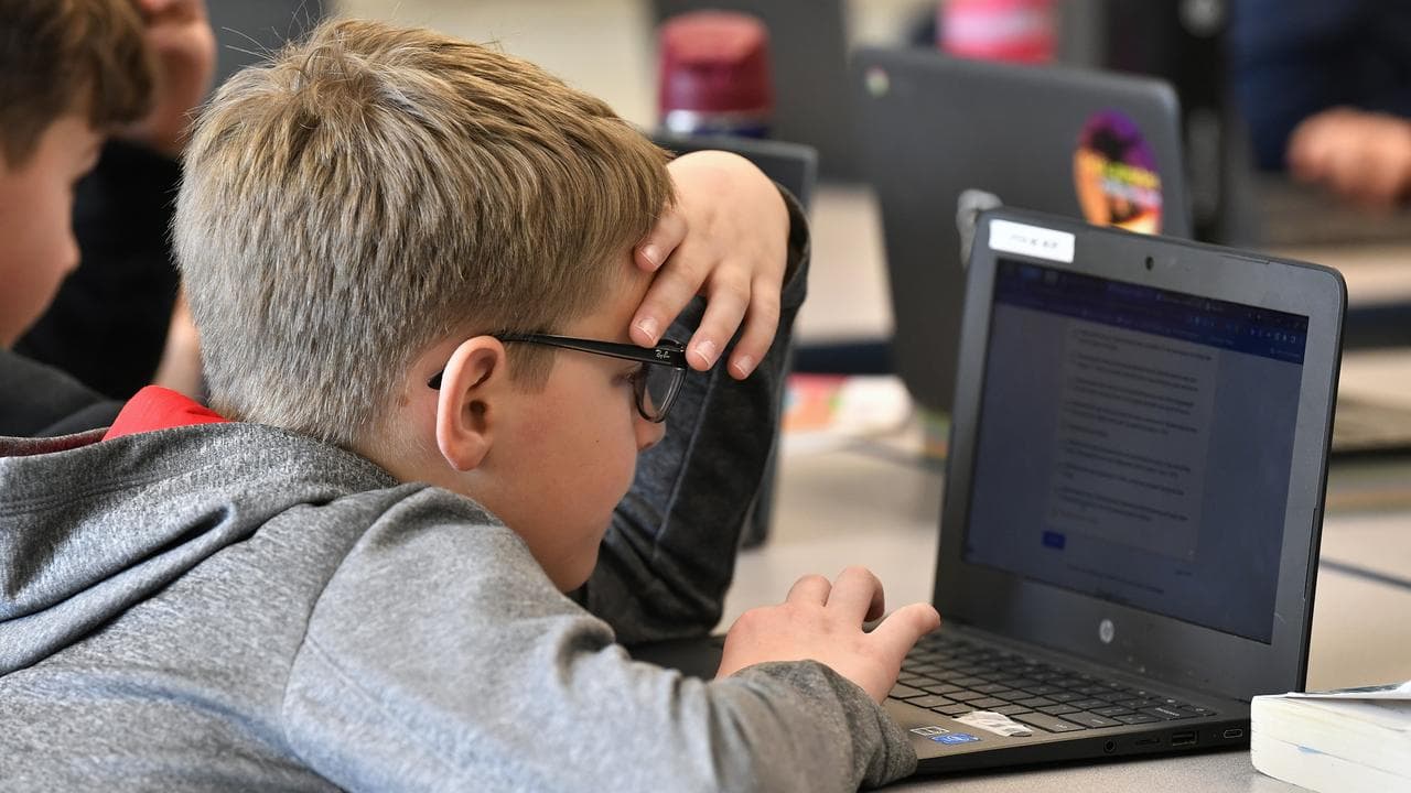 Students in the class using AI