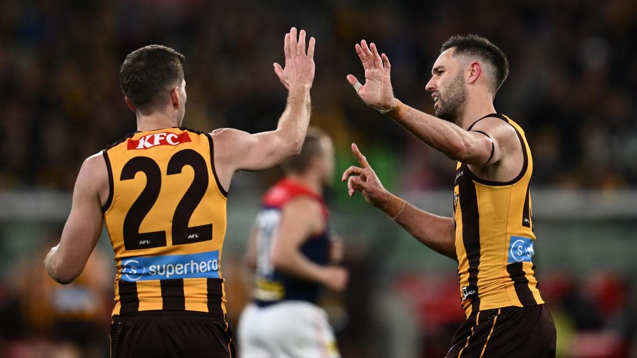 Luke Breust high-fives Jack Gunston.