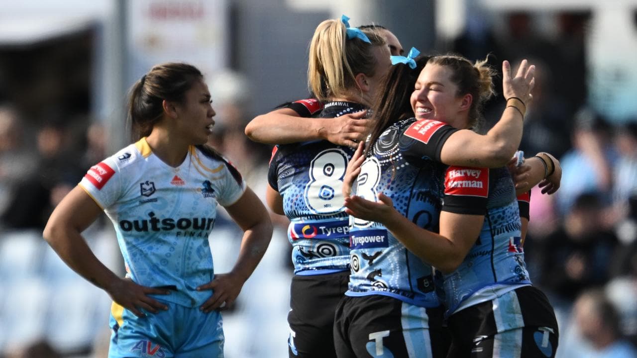 Celebrating Cronulla players.