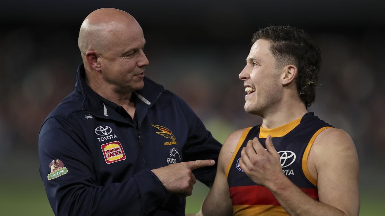 Crows coach Matthew Nicks makes a point with forward Jake Soligon.