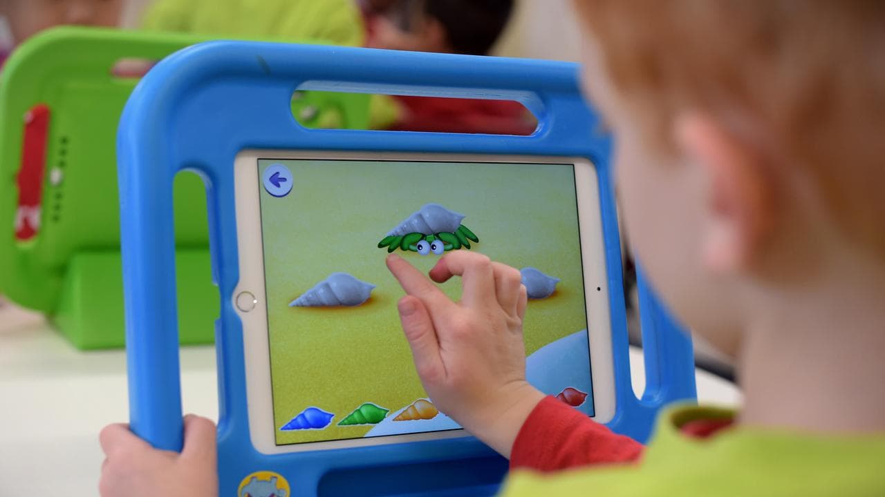 A child plays on an iPad (file image)