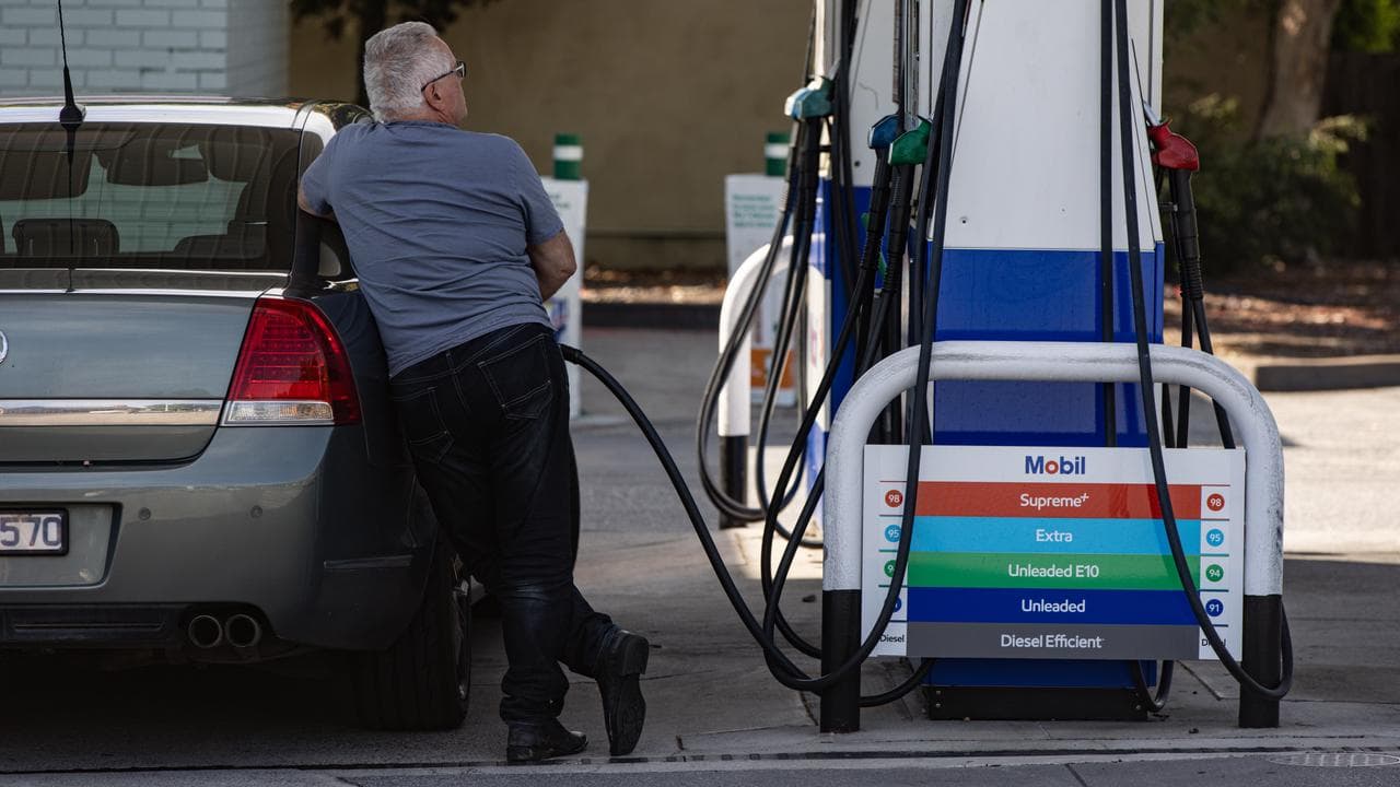 A man putting petrol in his car (file image)
