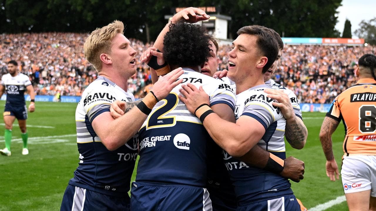 Celebrating Wests Tigers players.