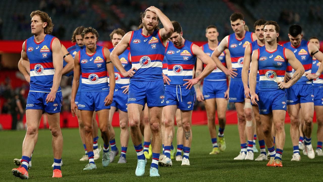 Disappointed Western Bulldogs players.