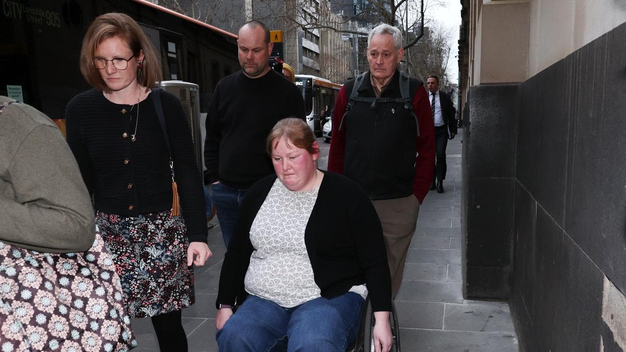Ruth Dubois (centre) and her father Ian Wilkinson (right)