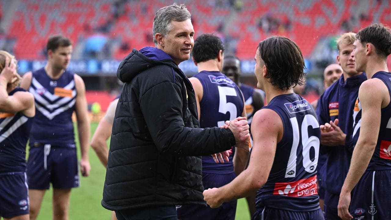 Justin Longmuir celebrates with Murphy Reid.