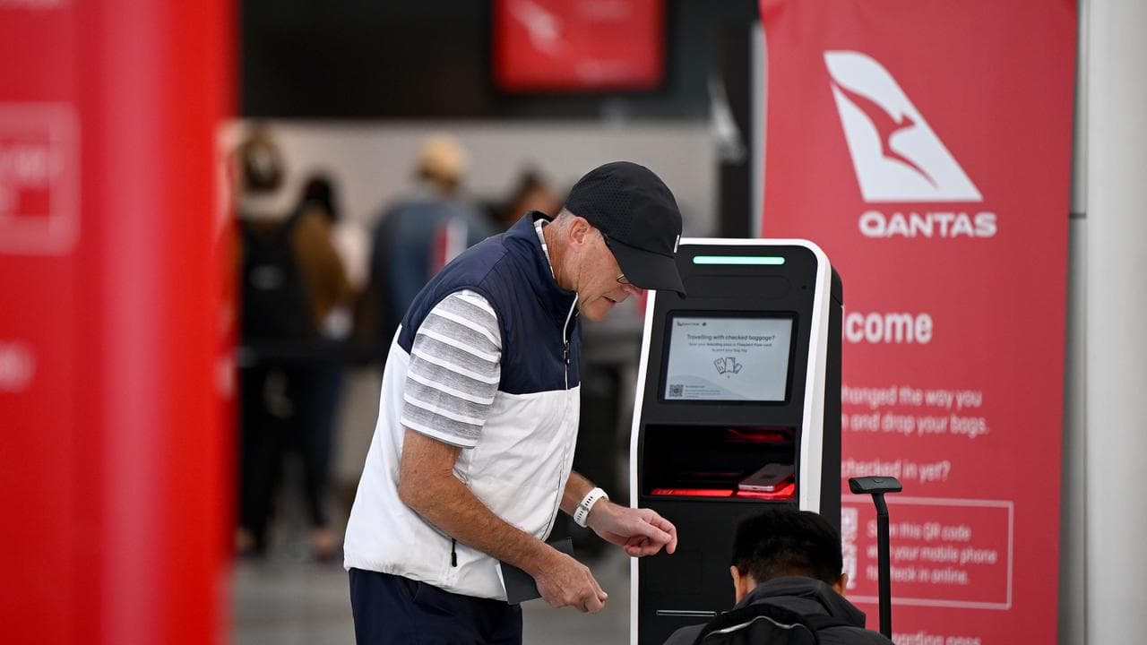 Passengers at the Qantas domestic terminal