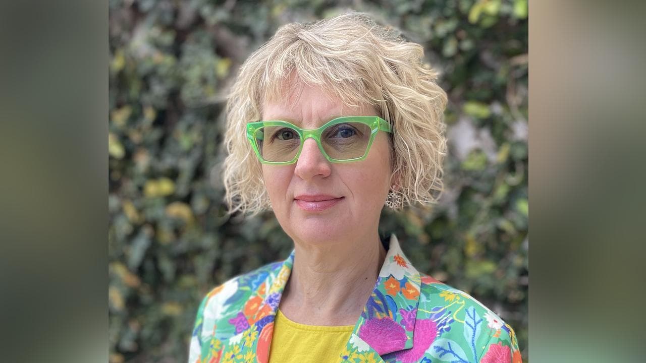 Dr Susannah Morris poses for a photograph after cancer treatment