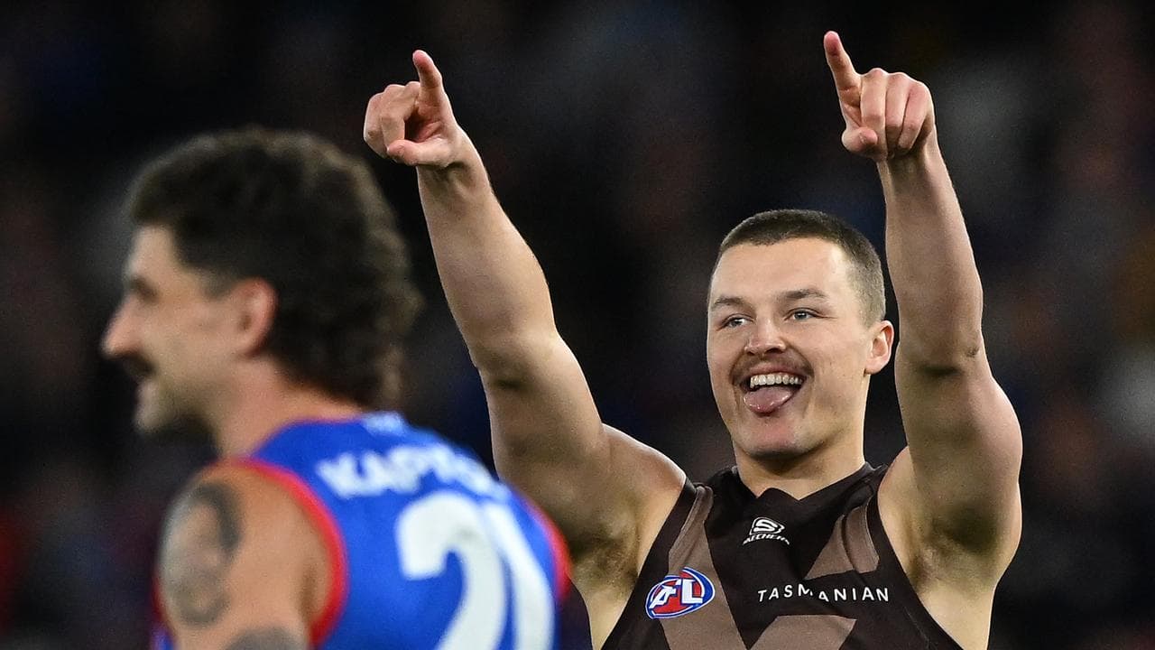 Jack Ginnivan of the Hawks (right)