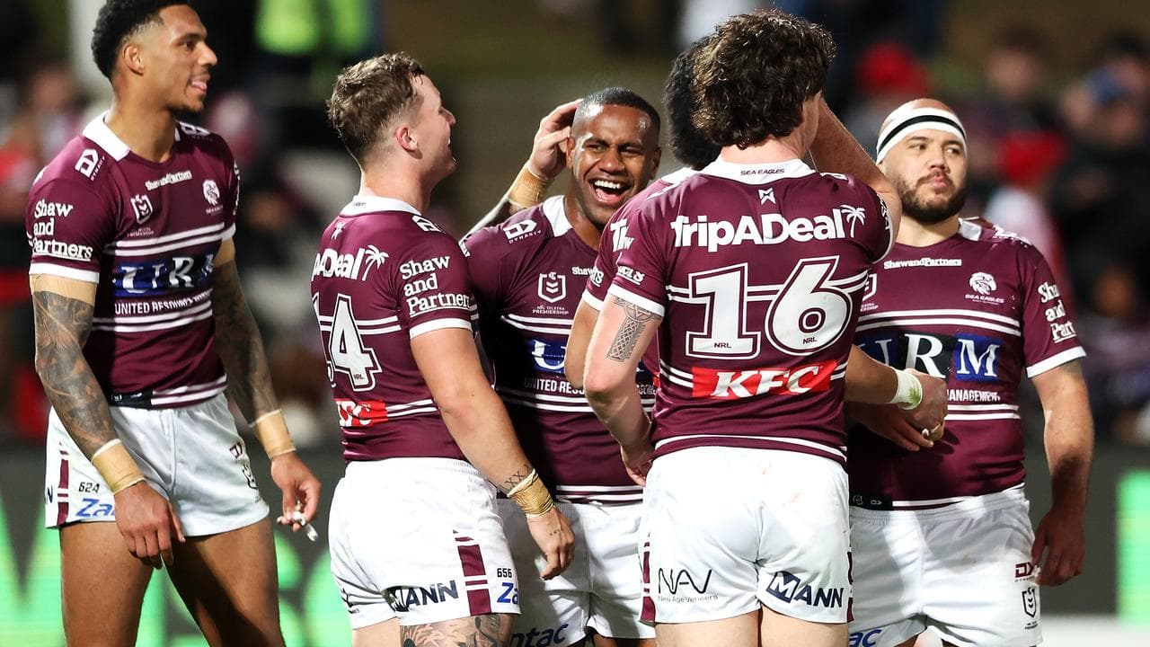 Manly teammates rush to congratulate Caleb Navale