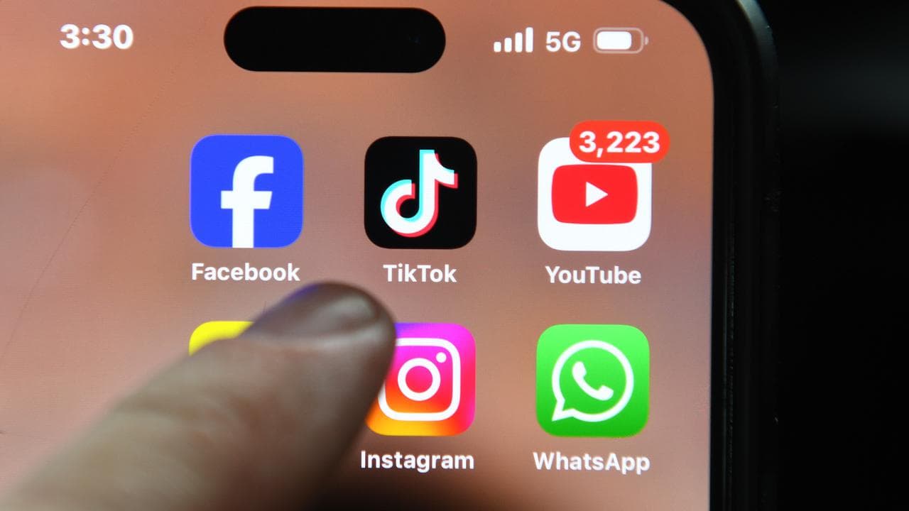 Social media apps on a phone (file image)