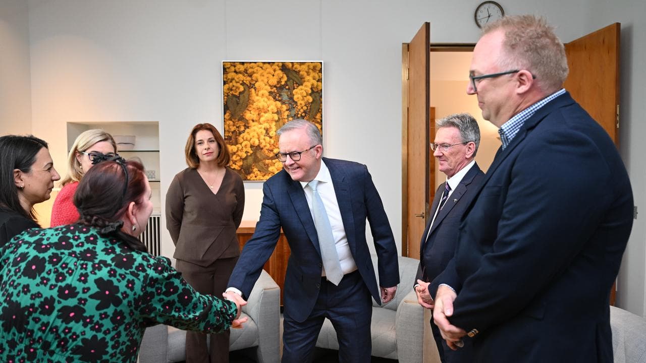 Anthony Albanese and Australian Communications Minister Anika Wells