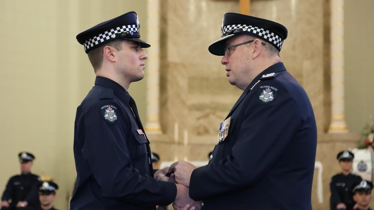 Vadim De Waart-Hottart shakes hands with Graham Ashton, Melbourne