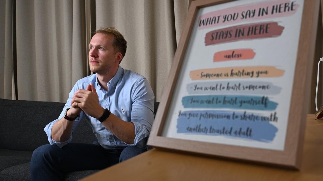 Psychologist Brendon Wright poses for a portrait