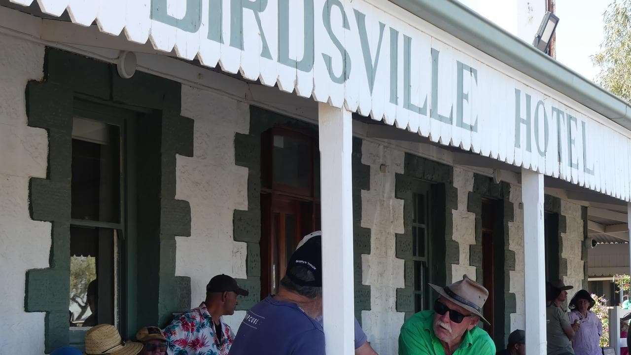 Crowds gather at the Birdsville Hotel