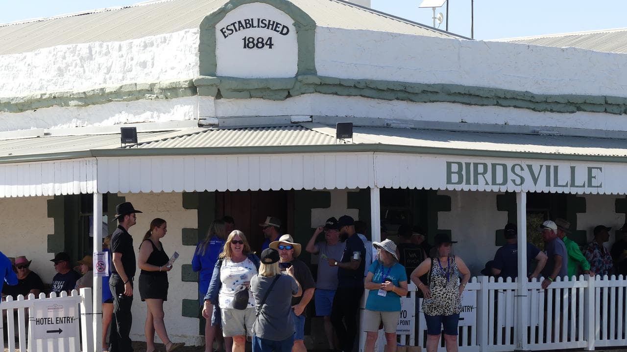 Crowds gather at the Birdsville Hotel