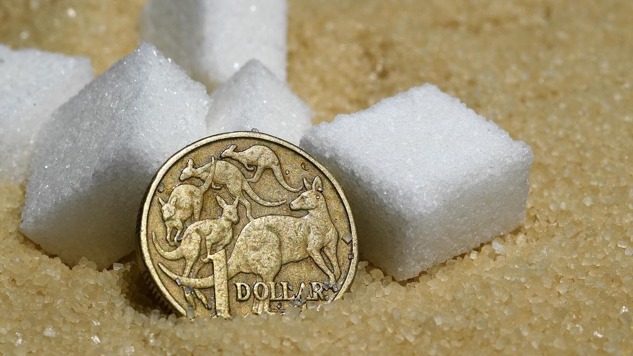 A dollar coin among sugar cubes (file image)