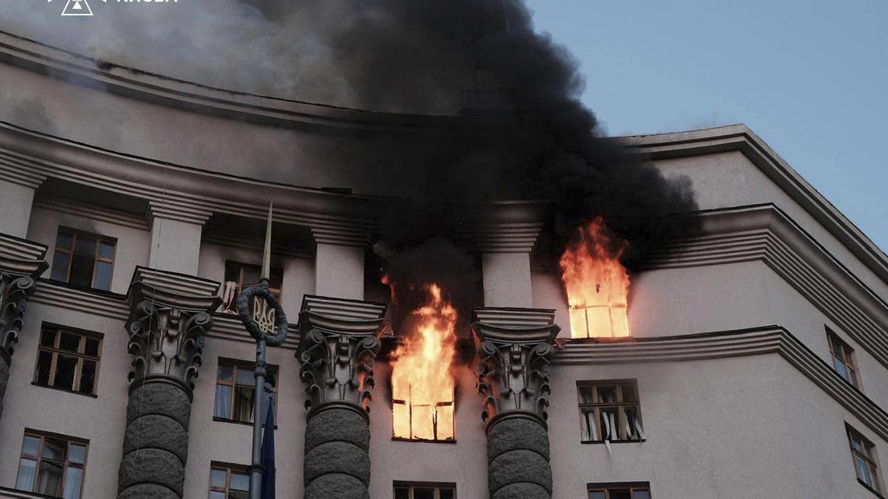 smoke rises from a fire in building in Ukraine