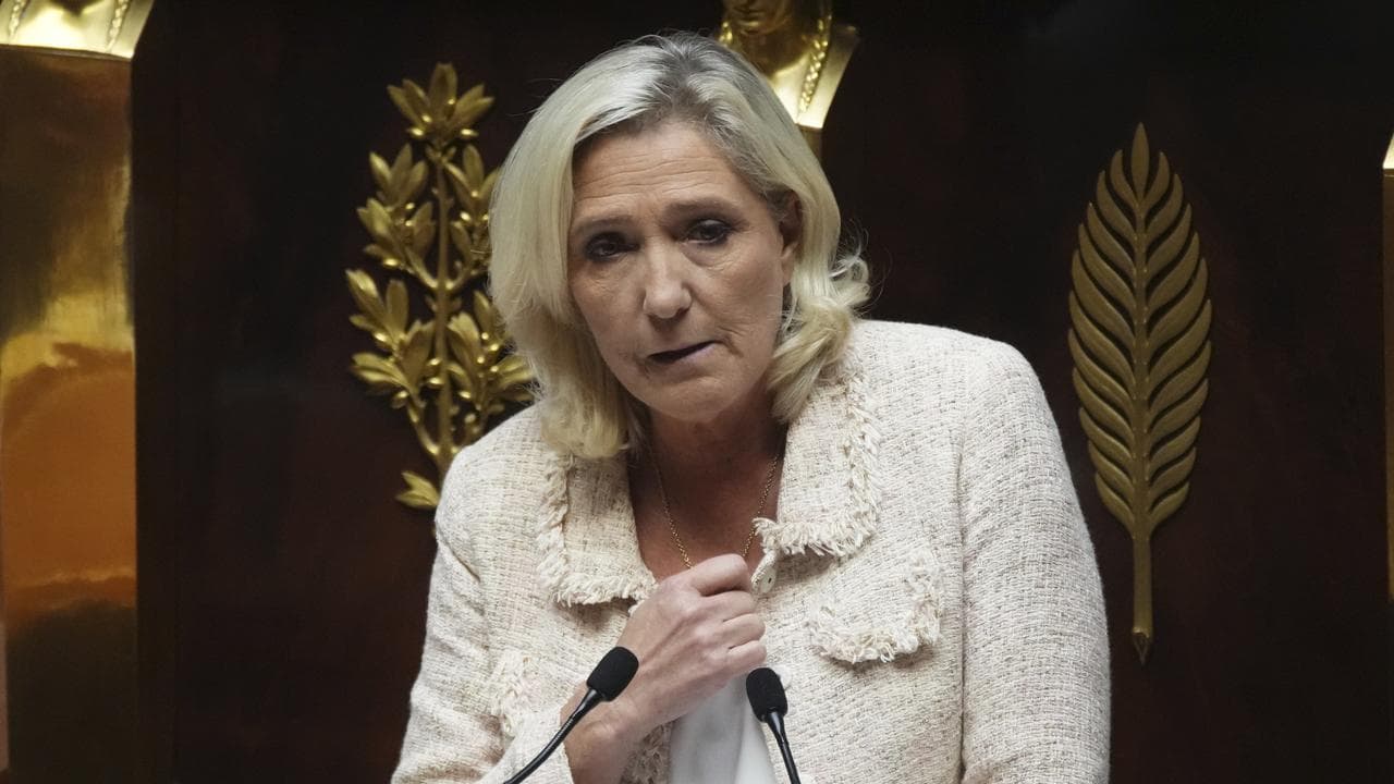 French far-right leader Marine Le Pen addresses the National Assembly
