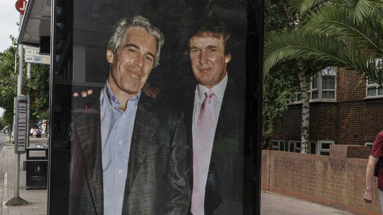 a poster showing President Donald Trump and Jeffrey Epstein