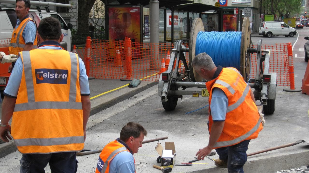 Telstra technicians at work (file image)
