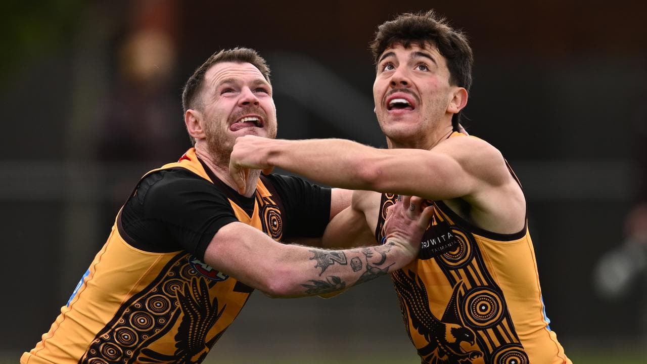 Blake Hardwick and Massimo D'Ambrosio battle it out at training.