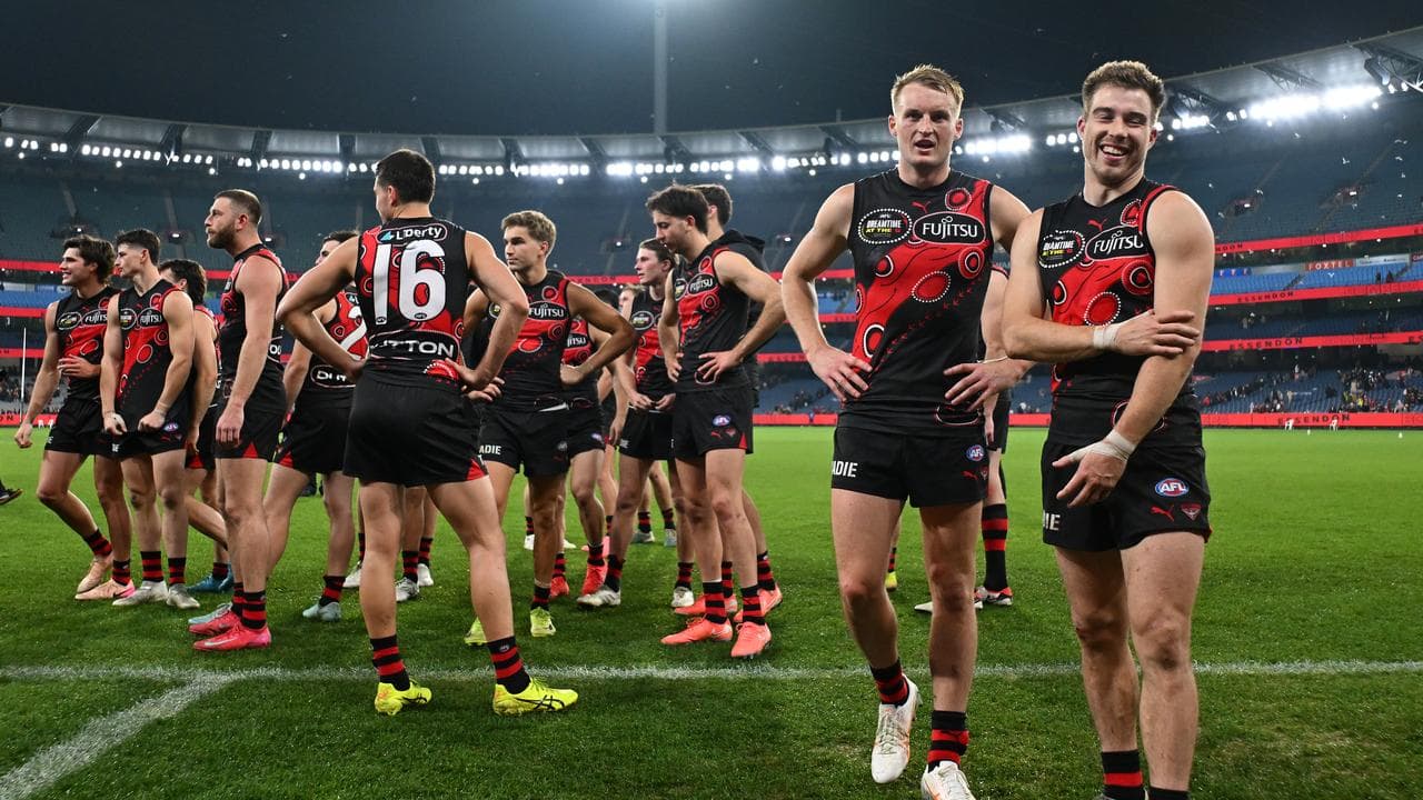 Zach Merrett (right).
