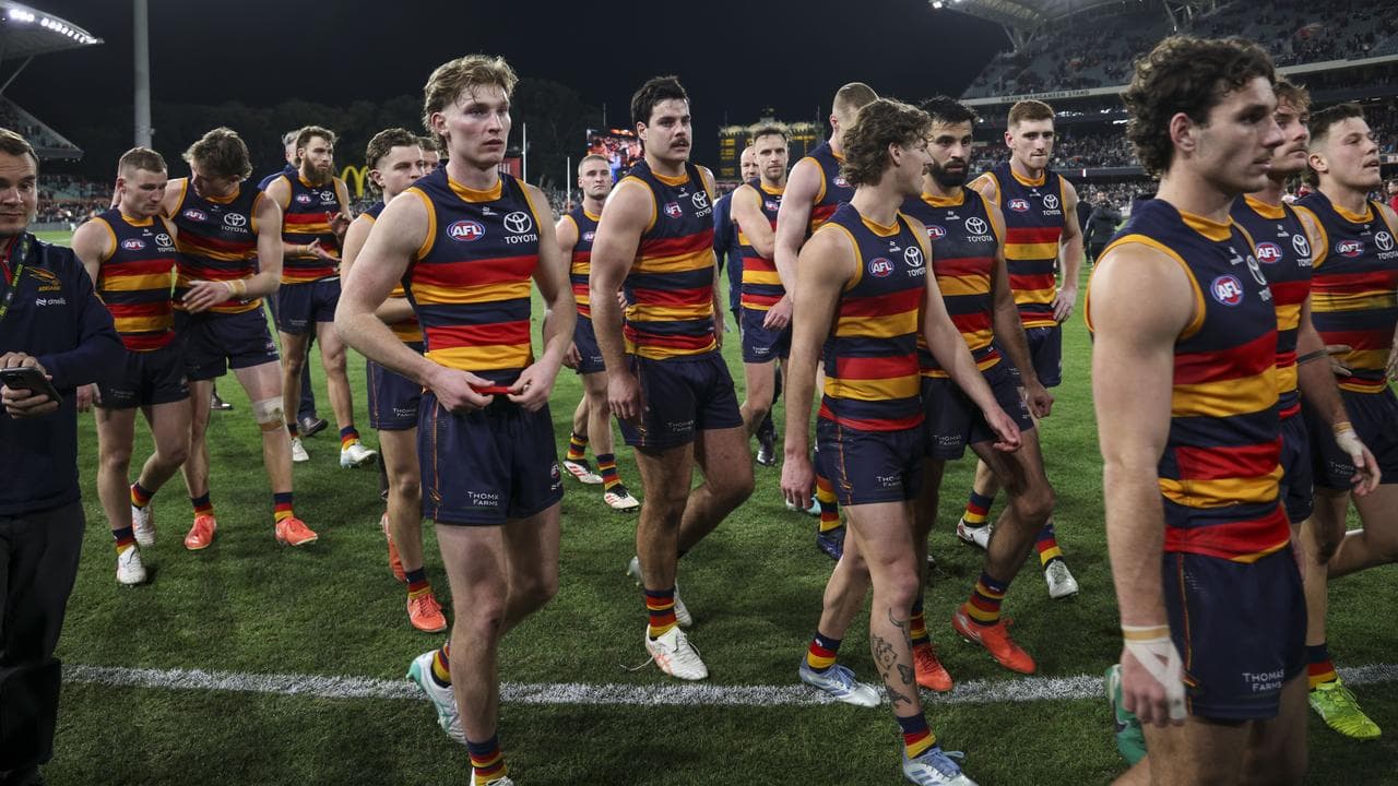 Disappointed Adelaide Crows players.