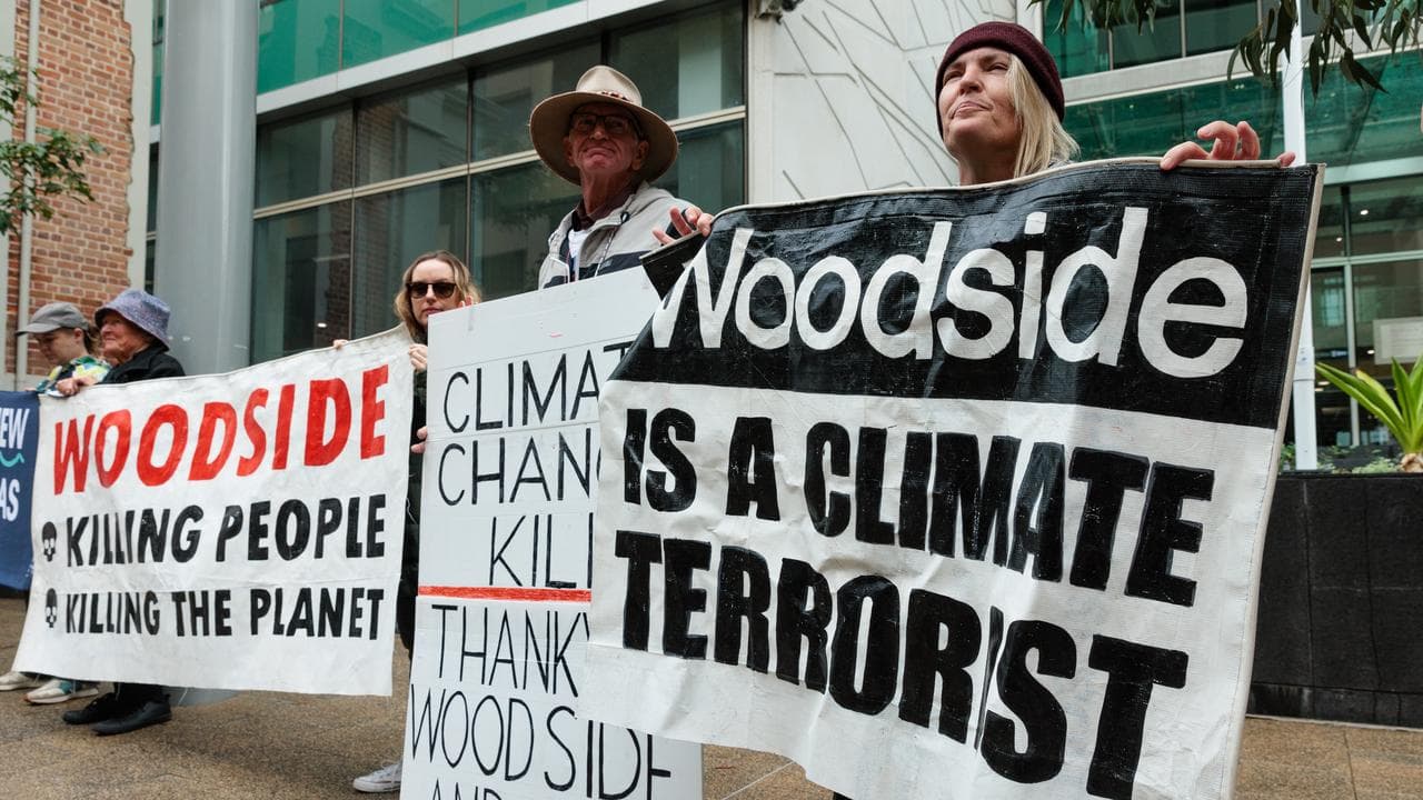 Protesters rally against the Woodside North West Shelf expansion