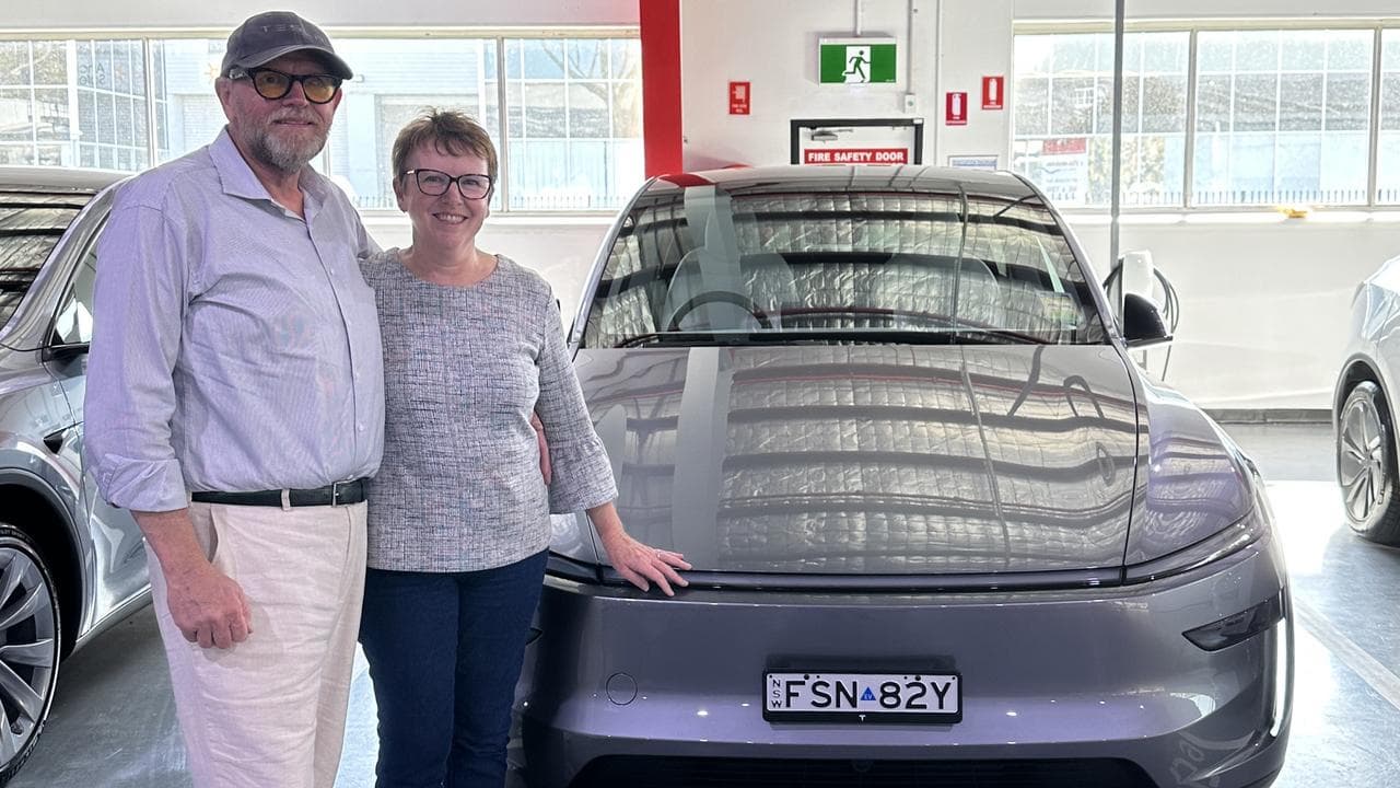 Tesla Owners Club of Australia president Peter Thorne and wife Sue