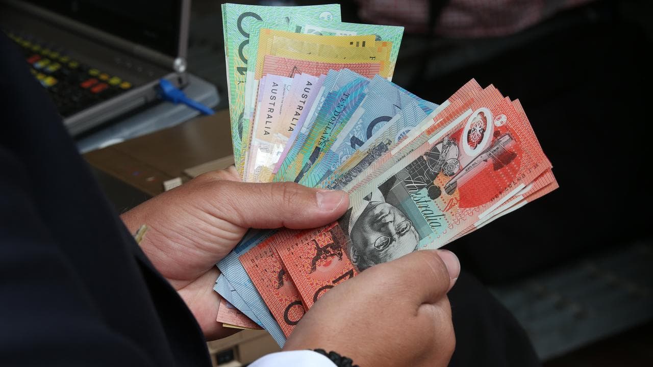 A file photo of a bookie with cash