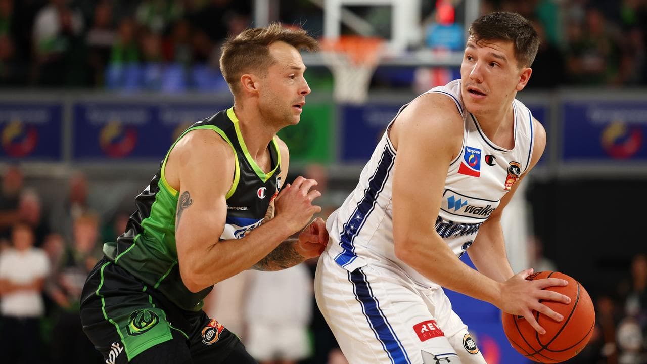 Adelaide 36ers captain DJ Vasiljevic (right)