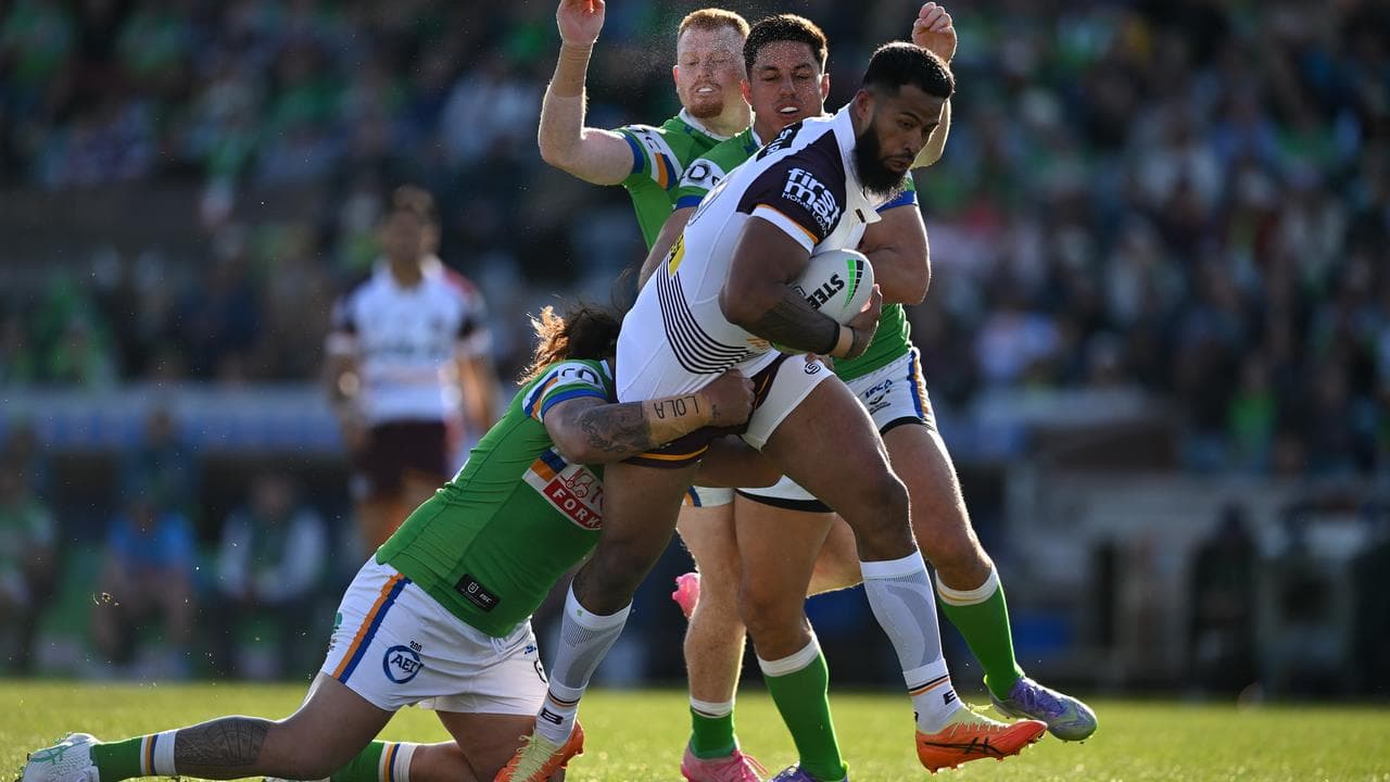 Josh Papalii tackles Payne Haas