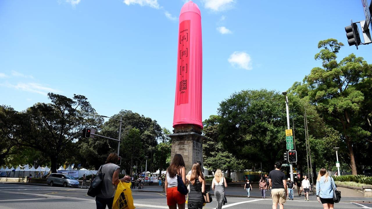 A giant pink condom covers the Hyde Park Obelisk