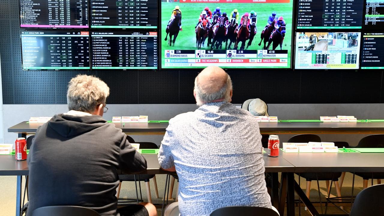 Customer's are seen inside a Tabcorp venue