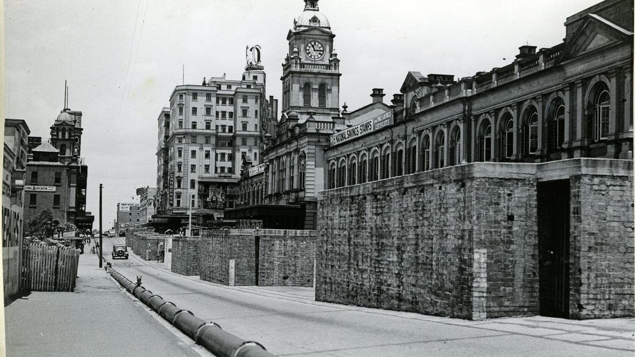 An historical photo of air raid shelters in central Brisbane.