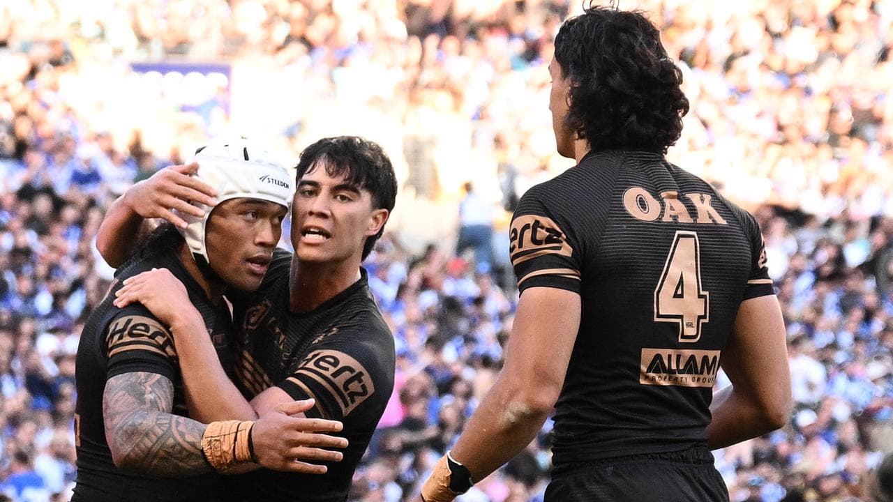 Brian To'o of the Panthers (left)