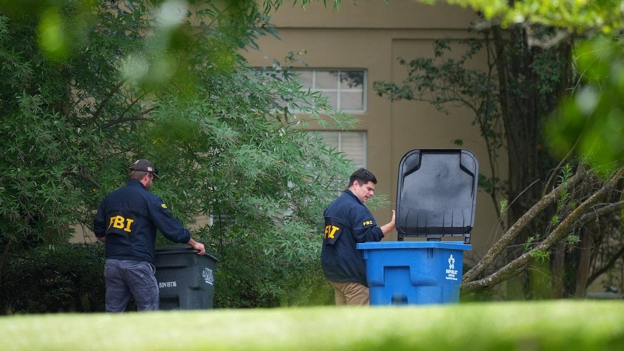 FBI agent search around a home linked to an ICE facility gunman